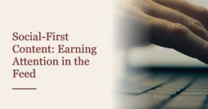 Cover reading Social-First Content: Earning Attention in the Feed, beside a hand poised over a laptop keyboard.