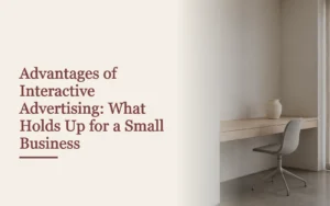 Cover titled Advantages of Interactive Advertising beside an empty desk with a chair and vase