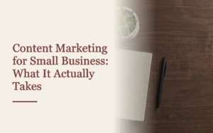 Headline cover for small-business content marketing beside a closed laptop and notebook